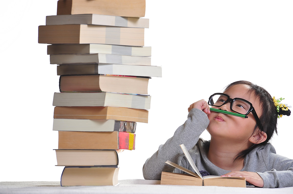 asian girl w.book stack.jpg