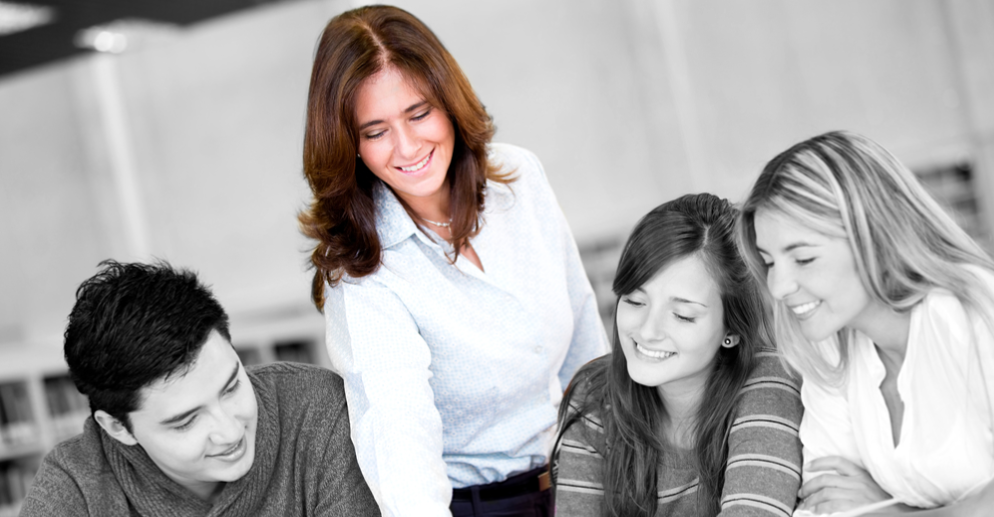 Teacher teaching her students