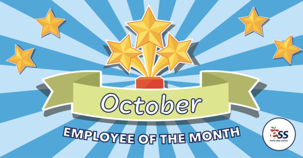 Striped background with stars along with a three-star trophy and a banner announcing the October employees of the month