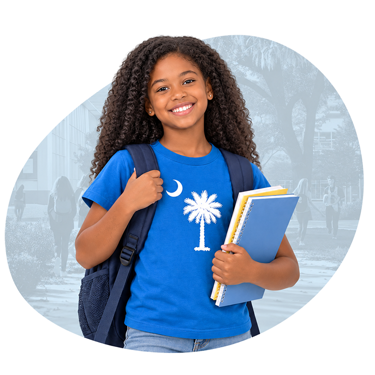 Smiling student wearing a blue South Carolina palmetto shirt, holding notebooks and carrying a backpack in front of a school campus.